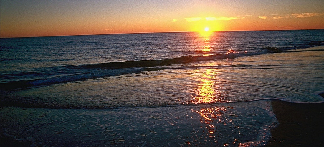 The sun rises over the eastern shores of North Carolina.