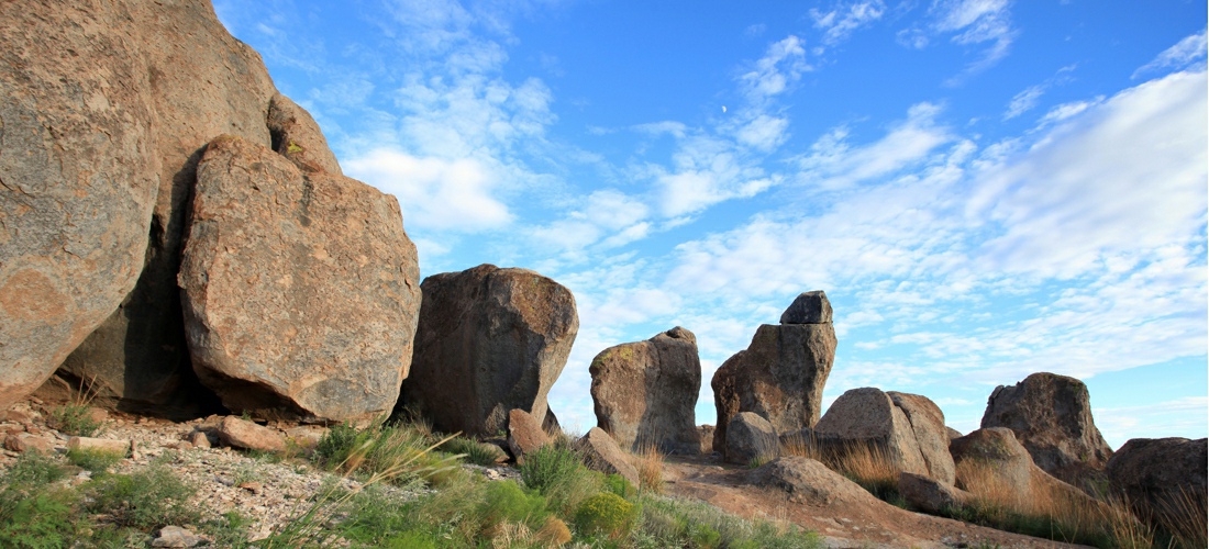 City of Rocks State Park is a popular state park of New Mexico,  consisting of large sculptured rock formations in the shape of pinnacles and boulders rising as high as 40 feet.  USA Travel Guide.