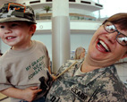 Nana's home! Cpt. Barbara Morales with her grandson, Kai.